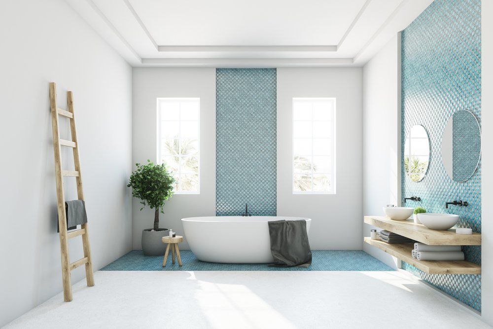 light bathroom with bathtub