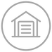 Gray circular home icon with a house and garage outline inside
