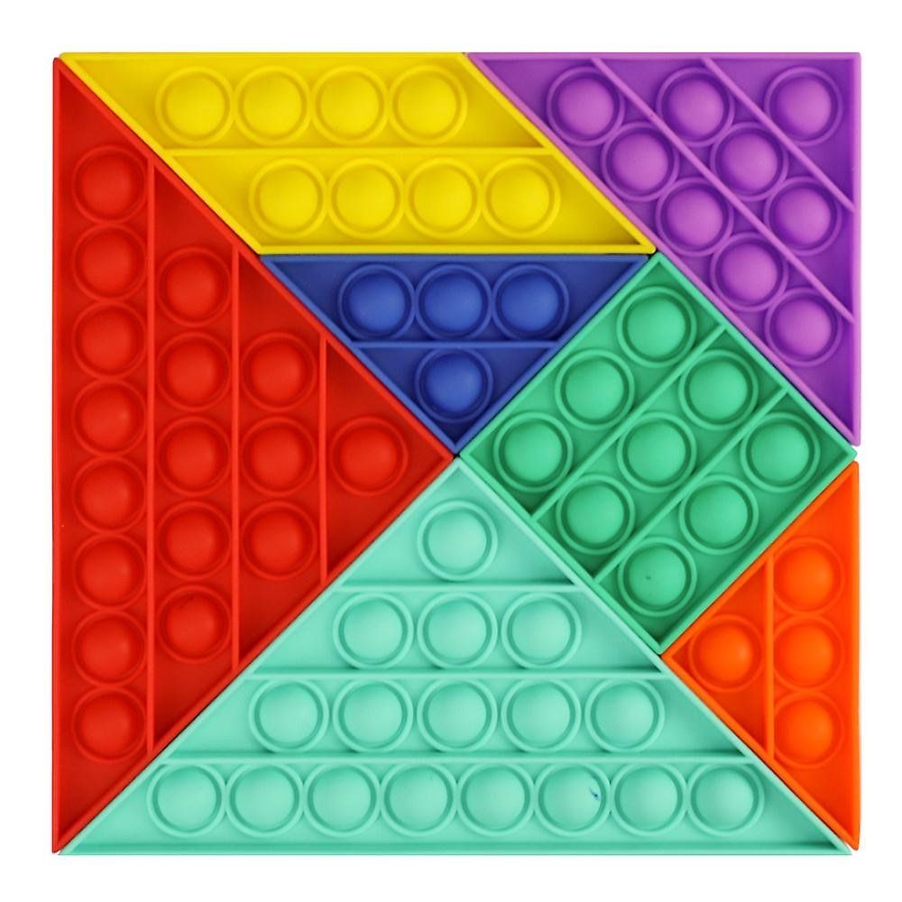 A colorful pop it fidget toy in the shape of a tangram.