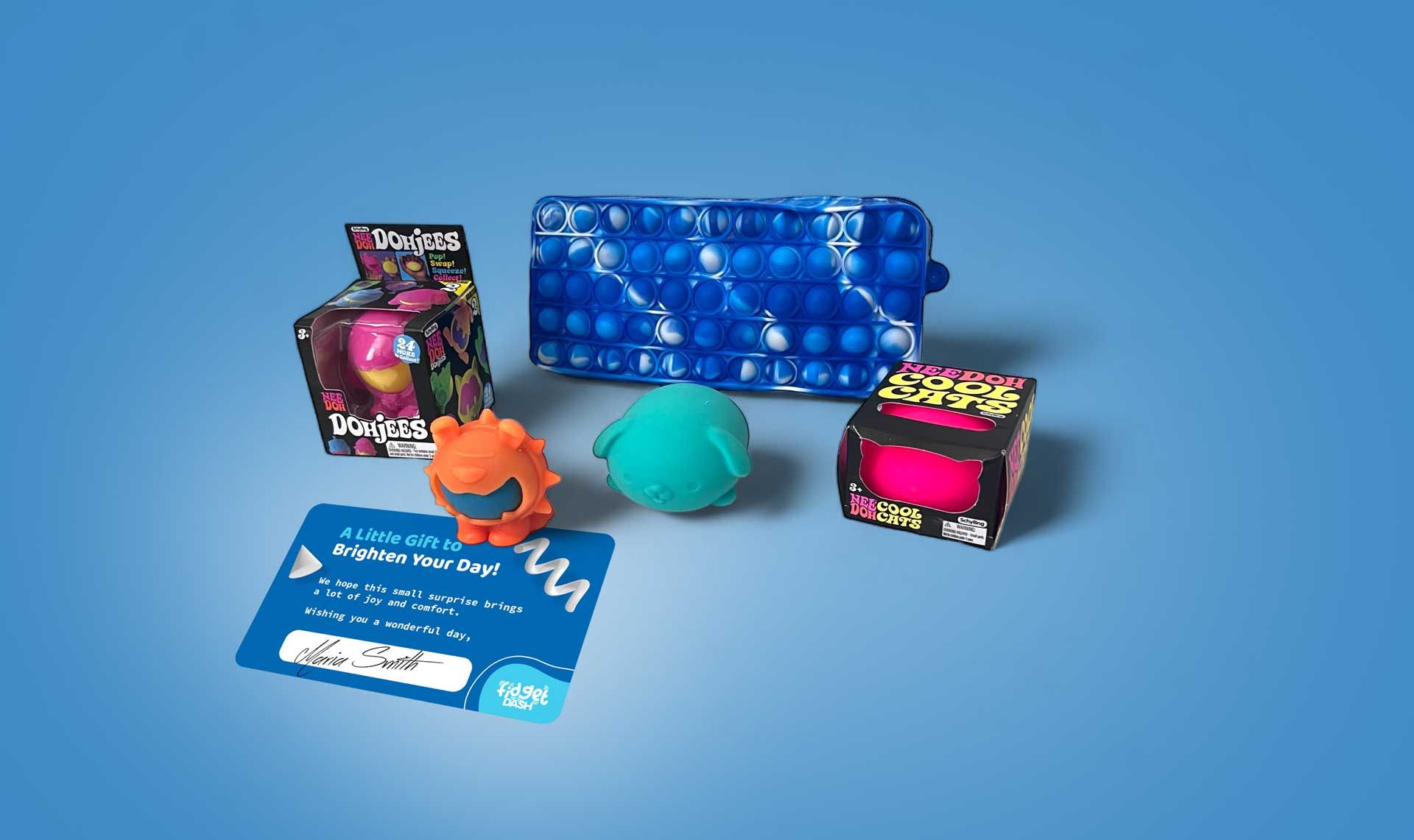 A group of toys are sitting on top of a blue surface.