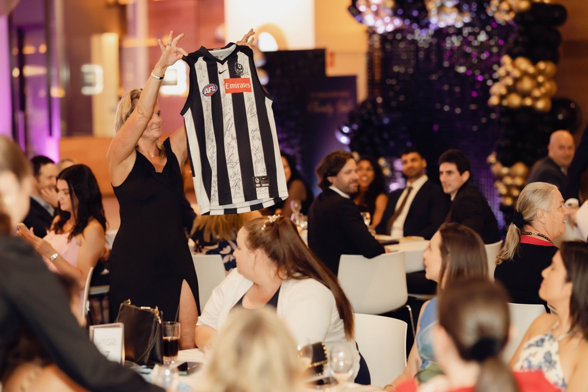 Signed Collingwood guernsey shown during the charity auction at the EverLend International Women's Day Charity Gala