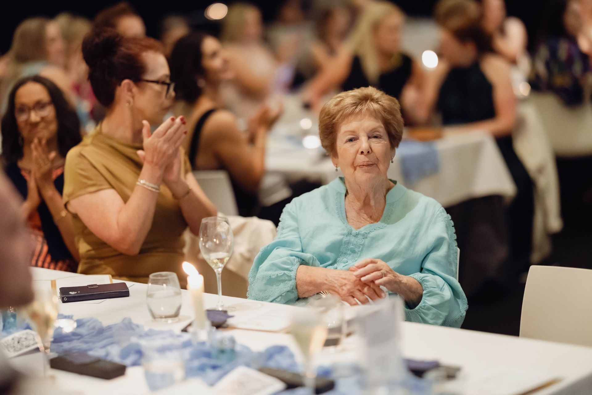 Guests applauding during the EverLend International Women's Day Charity Gala