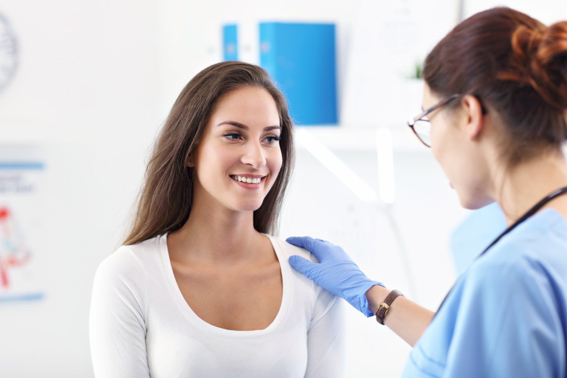 Physician Talking to Her Female Patient
