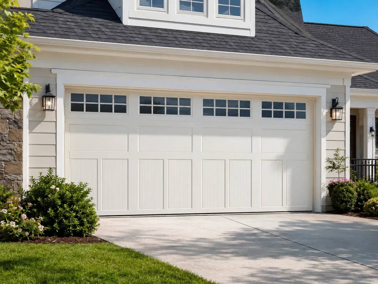 Fiberglass garage door with windows on a residential home exterior