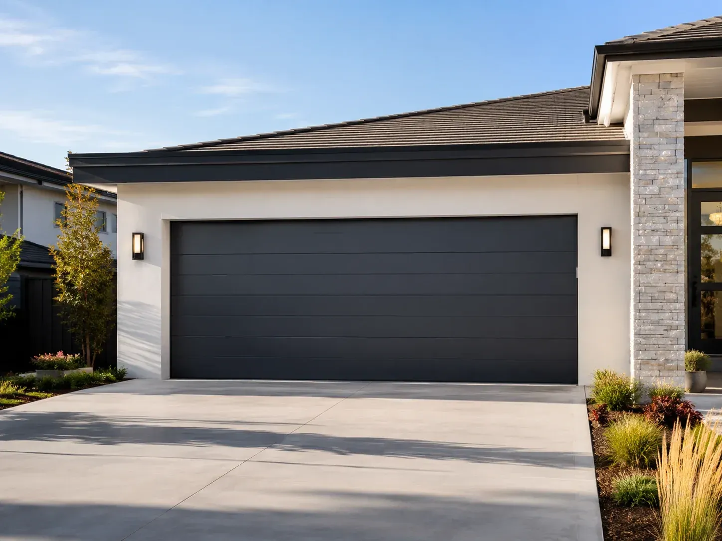 Modern black garage door on a residential home in Roscoe IL