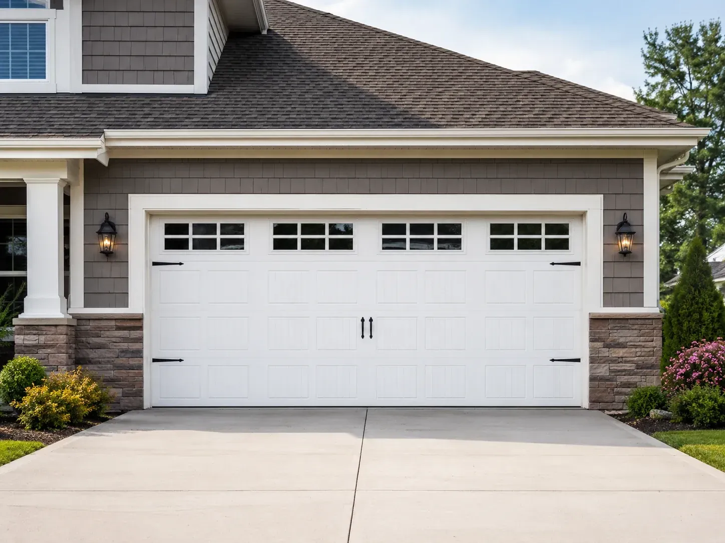White carriage house garage door with windows on a residential home in Roscoe IL