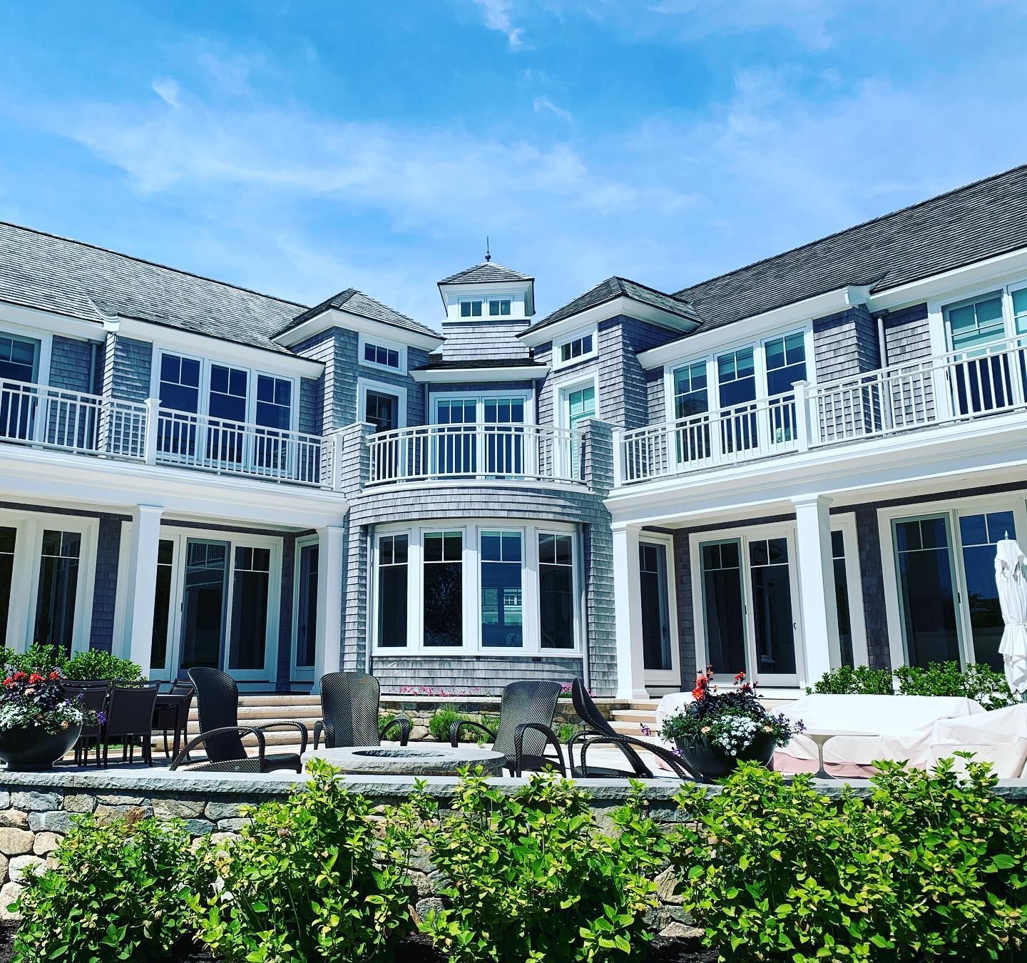 A large house with a lot of windows and balconies
