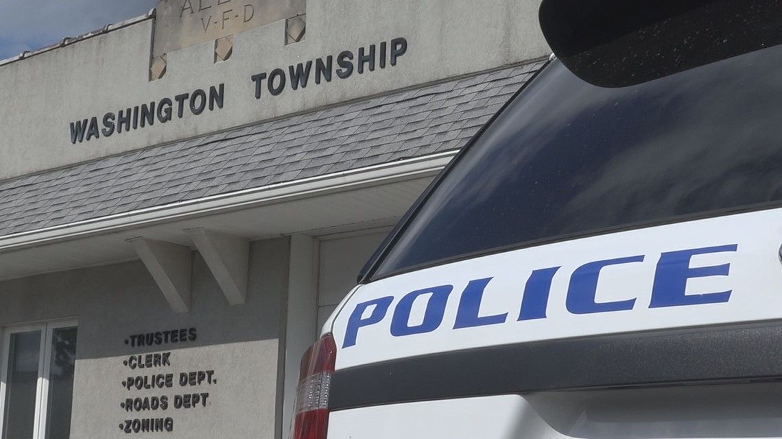 Police car in front of Washington Township municipal building entrance