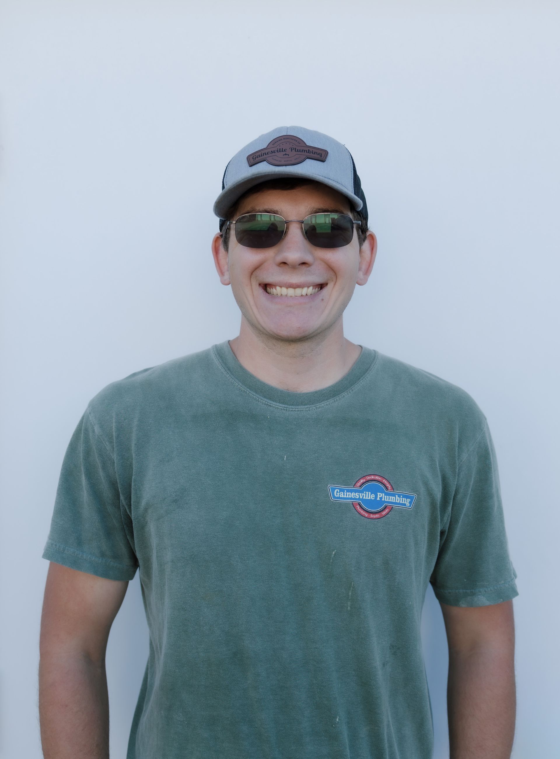 meet the team image placeholder of a man smiling with a black background
