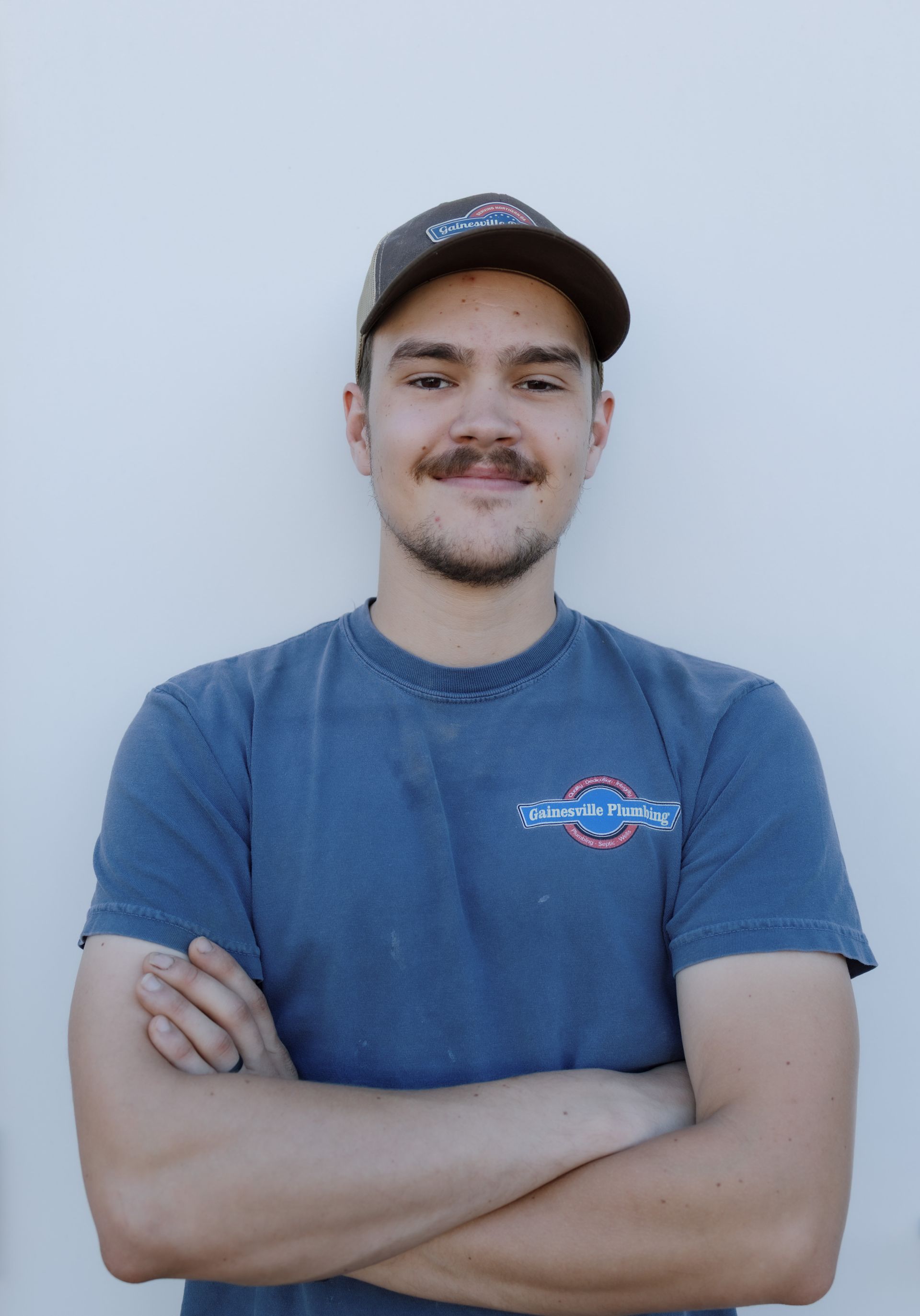 meet the team image placeholder of a man smiling with a black background