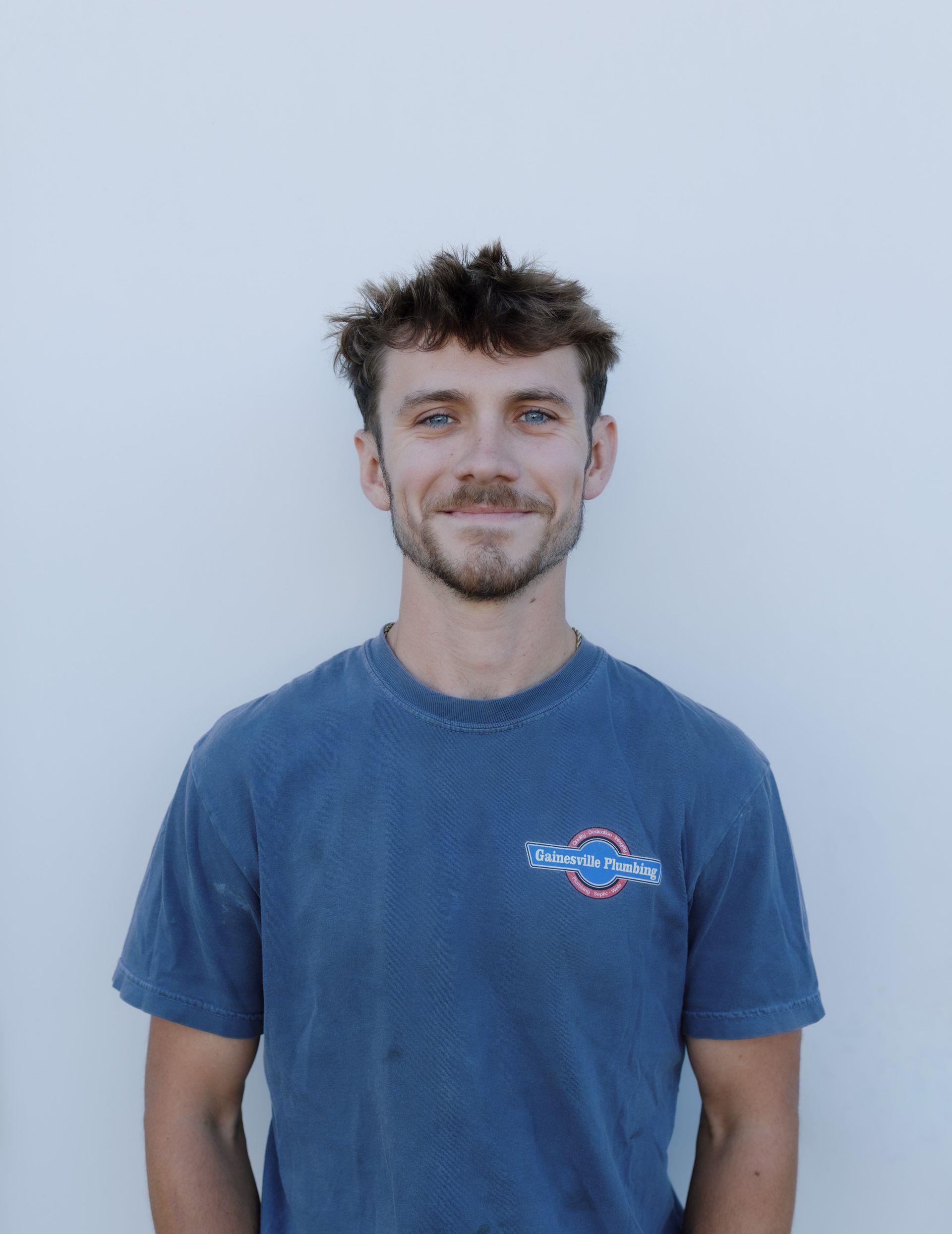 meet the team image placeholder of a man smiling with a black background