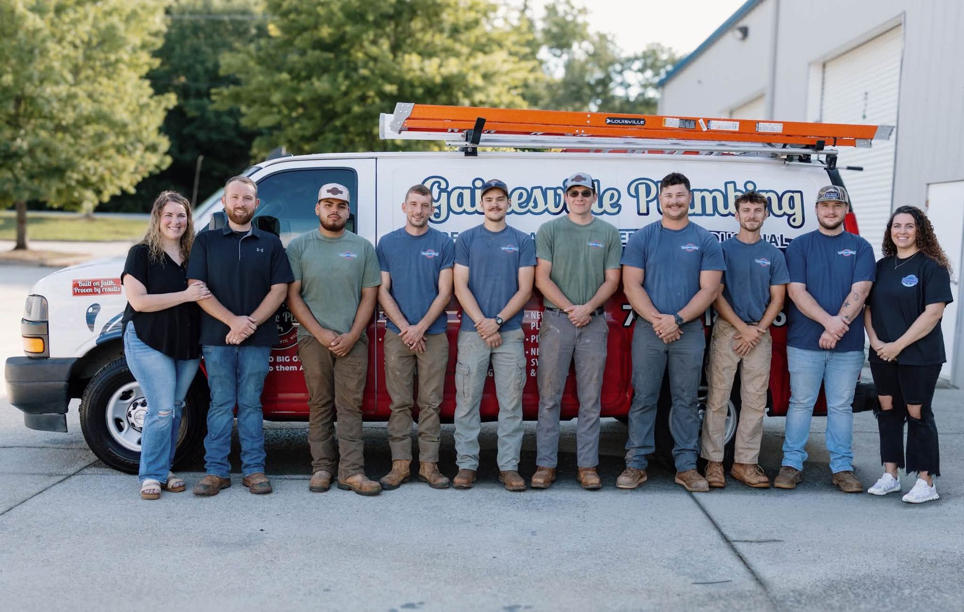 gainesville plumbing meet the team with a septic pump truck in red and white in gainesville ga