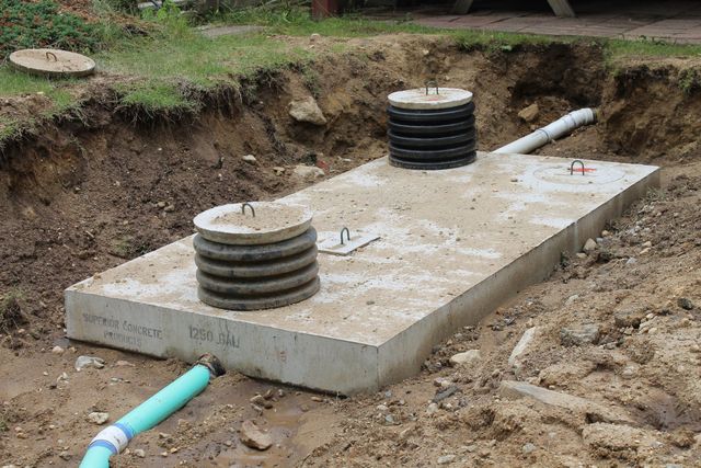 septic tank pump outside of a house that needs repair