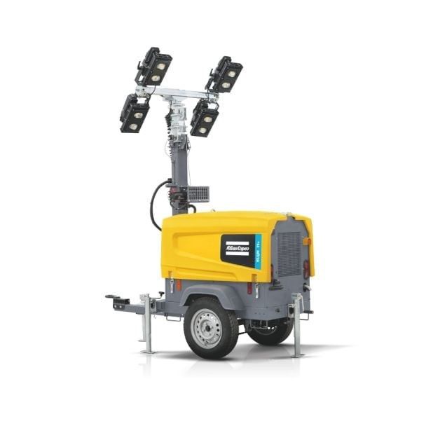 Yellow mobile lighting tower with four LED lights, on a trailer.