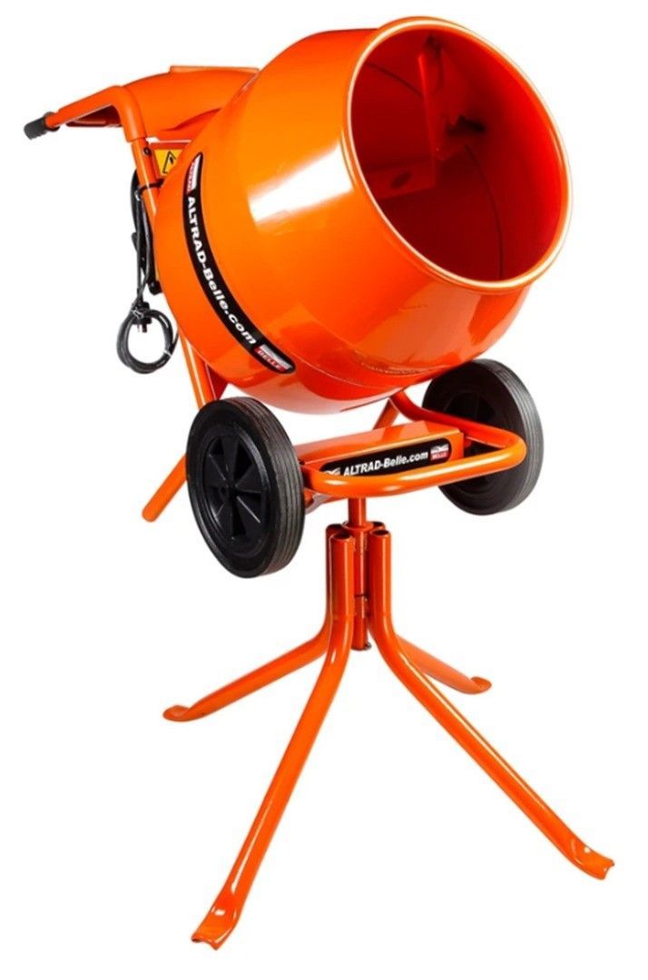 Orange cement mixer on a stand with wheels.