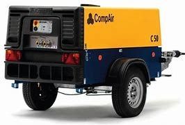 Red Crommins C12 air compressor with wheels, silver engine, and pressure gauges, on a white background.