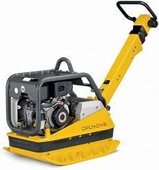 Yellow and gray plate compactor on a white background.