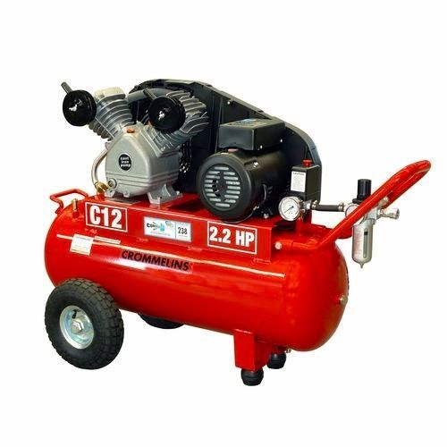 Red Crommins C12 air compressor with wheels, silver engine, and pressure gauges, on a white background.