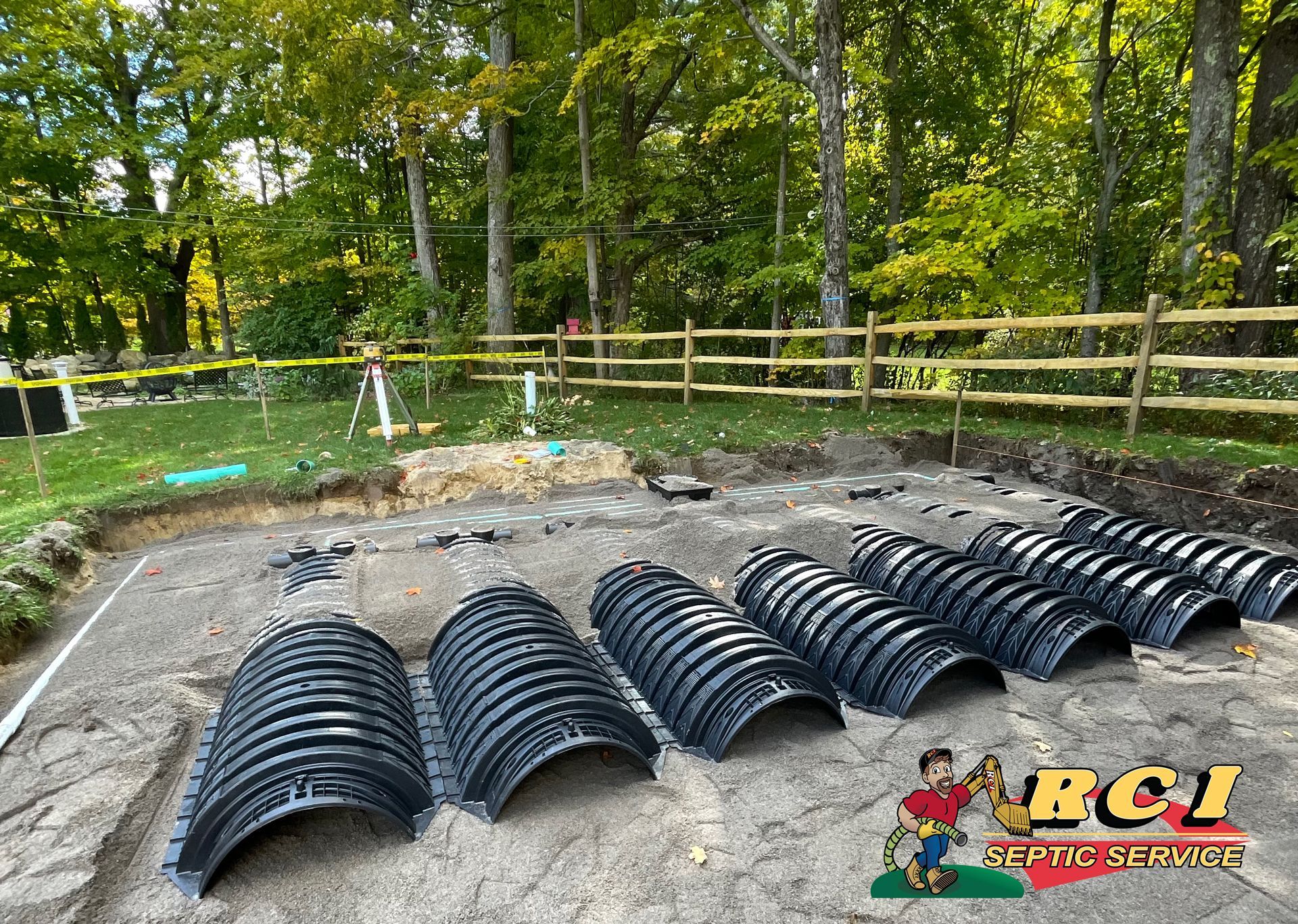 The septic system installation process in action.