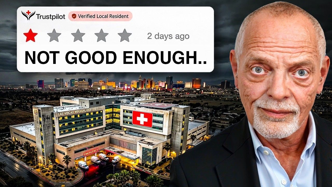 A man with a serious expression stands in front of a hospital building, with a Las Vegas skyline in the background.
