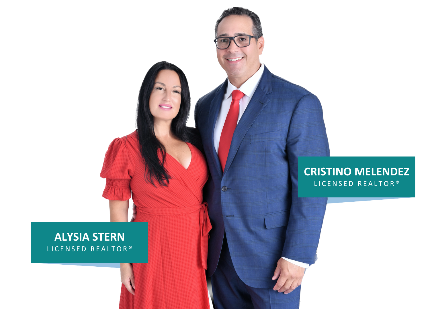A man in a suit and tie and a woman in a red dress are posing for a picture.