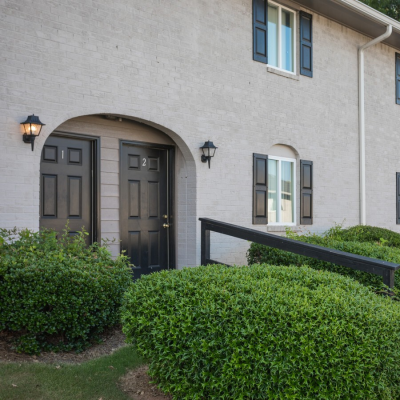 A house with a black door and black shutters