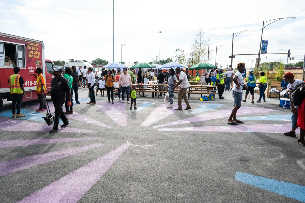 People enjoying Mahalia Jackson Court & Community Plaza.