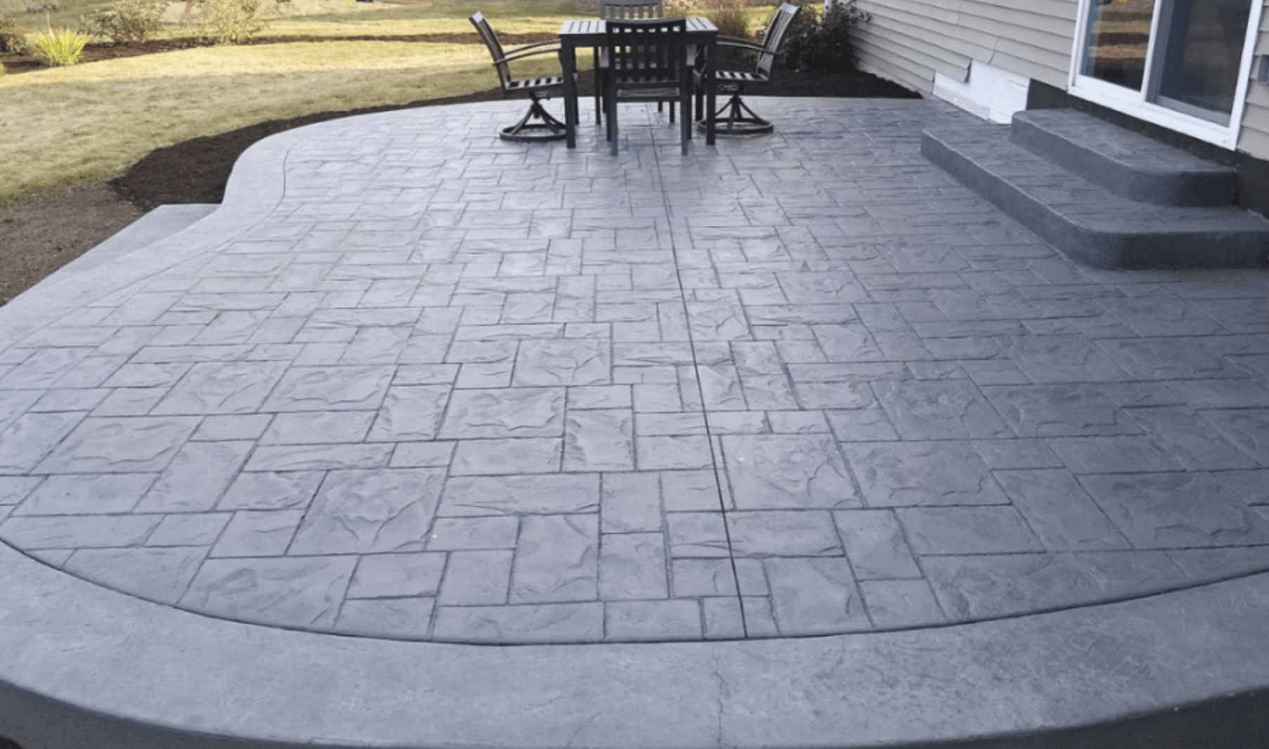 Professional concrete contractor repairs a driveway in cypress