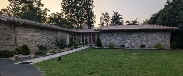 Front of a home before landscape lighting