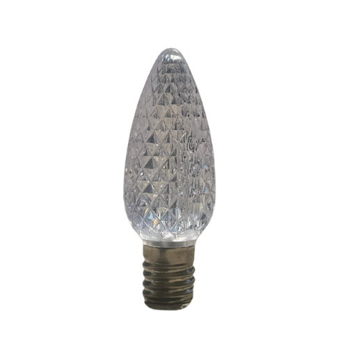 Clear, faceted LED light bulb with a brass base.