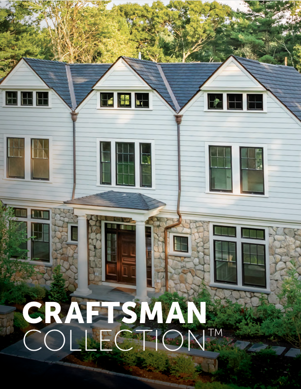 Craftsman-style white house with stone facade and dark roof, labeled “Craftsman Collection”