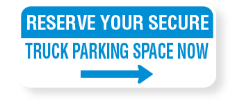 A blue and white sign that says reserve your secure truck parking space now