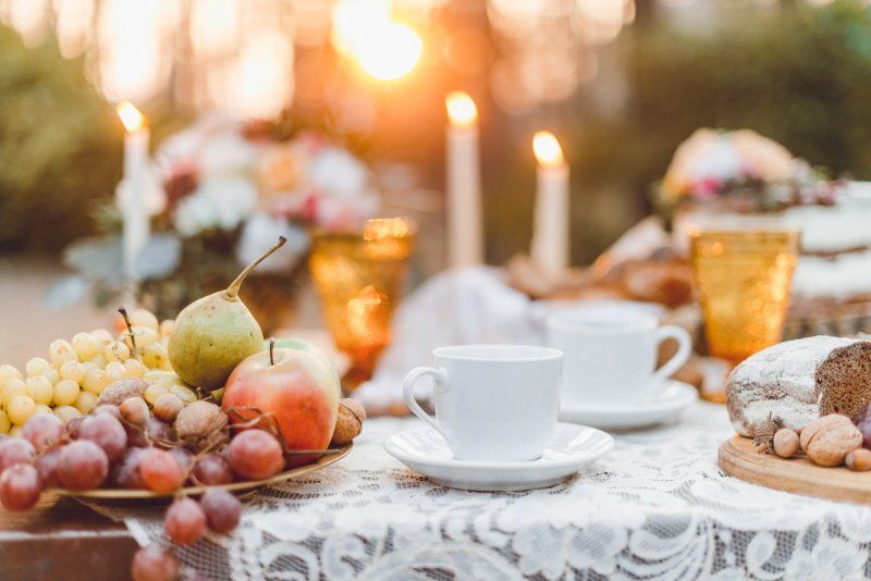 Boho Picnic Decor with fruit and coffee on table
