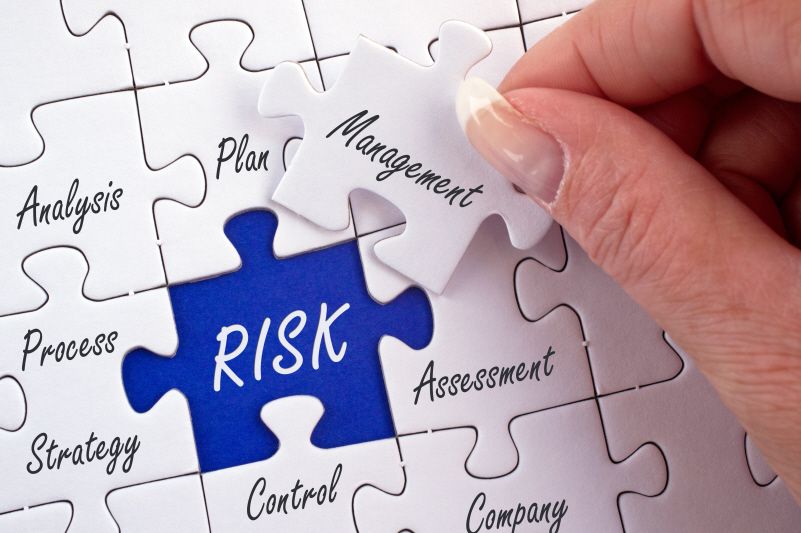 This 14 point Event Risk Management Checklist will help you minimize risks & disruptions to your event planning and includes risk identification & emergency preparedness. a puzzle with a blue risk piece about to be covered with a white management puzzle piece.