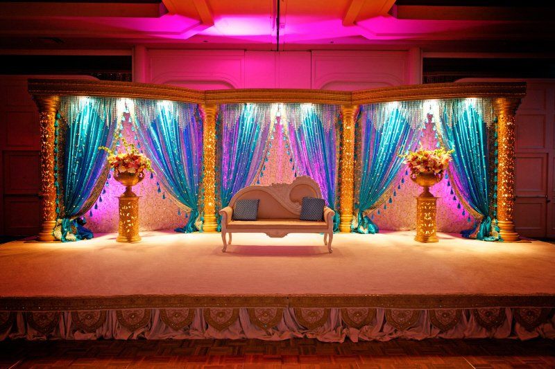Wedding celebration Indian Sangeet styled wedding decor with stage setting