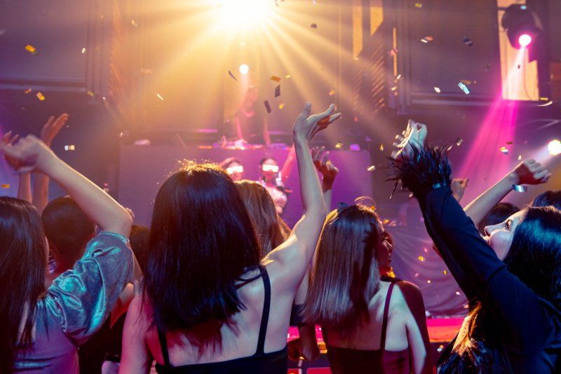 Student events graduate party showing young attendees dancing and having fun