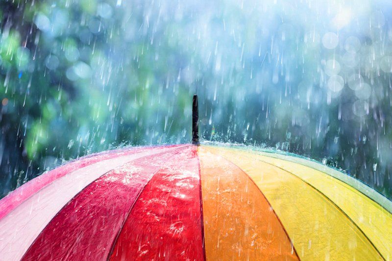 This Weather Contingency Planning Checklist provides 8 steps to avoid weather disasters and protect guests & crew during inclement weather at outdoor gatherings. a brightly colored umbrella is in the rain