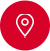 A white map location pin icon centered on a solid red circular background.