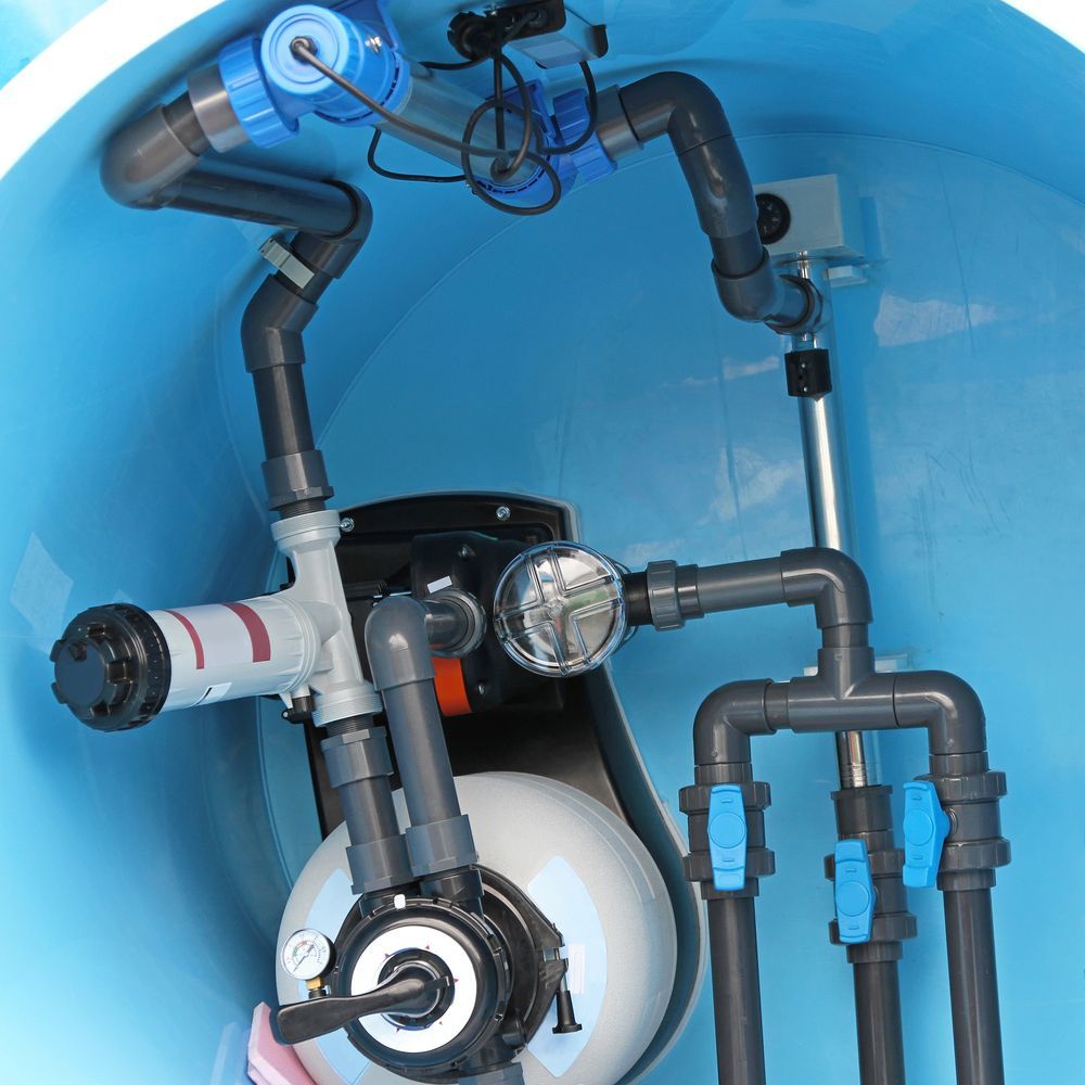 A Plumber Fixing A Clogged Drain — Ian Stanley Plumbing In Avoca, QLD
