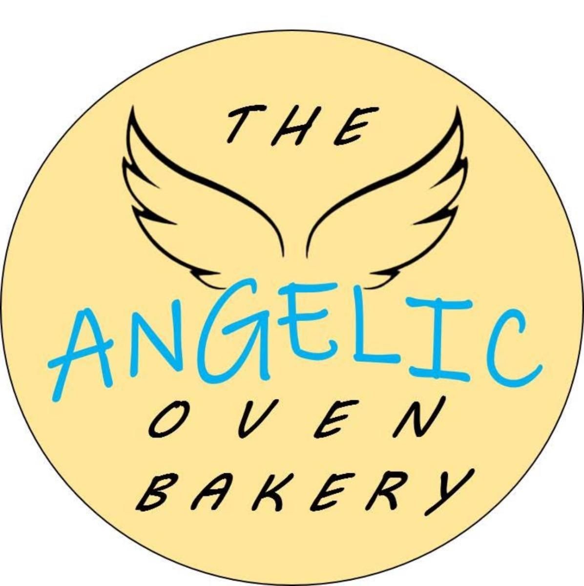 Logo for The Angelic Oven Bakery on a pale yellow circle with wings and blue text