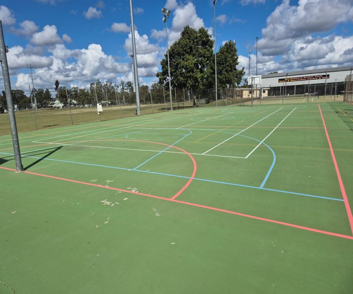 A Green Basketball Court With Red And Blue Lines — Spraywayz Linemarking Pty Ltd In Booral, QLD