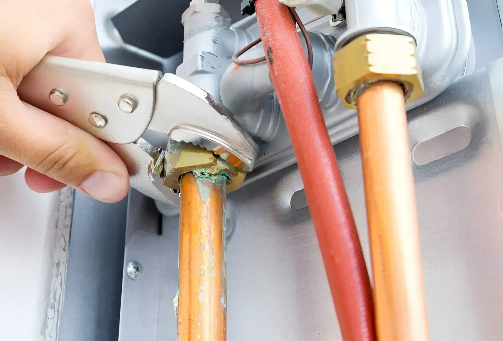 Copper Pipe Connected to A Boiler Unit — Dunnrite Plumbing Services in Proserpine, QLD
