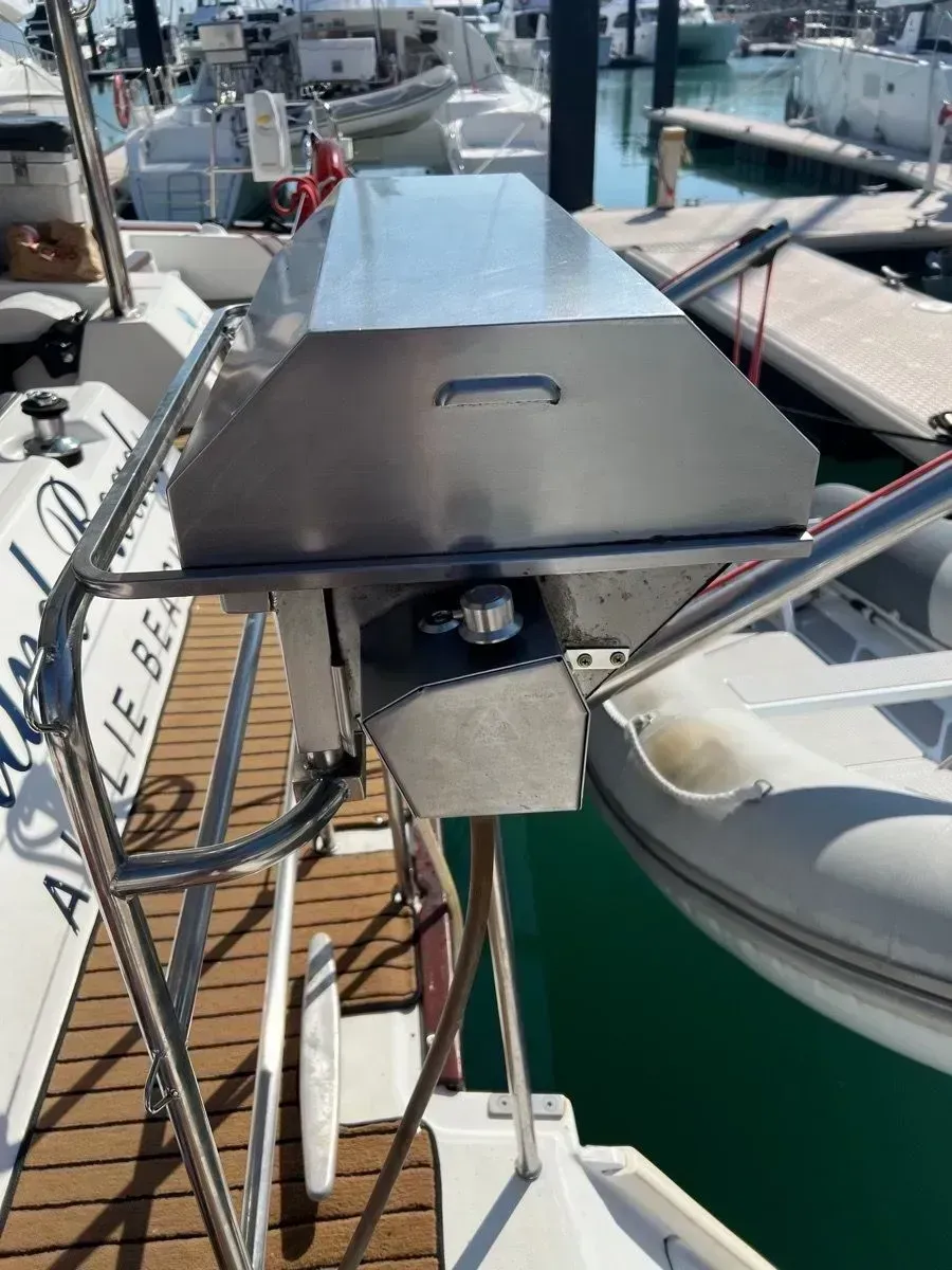 Stainless Steel Marine Grill Mounted on the Stern Rail of a Sailboat — Dunnrite Plumbing Services in Cannonvale, QLD