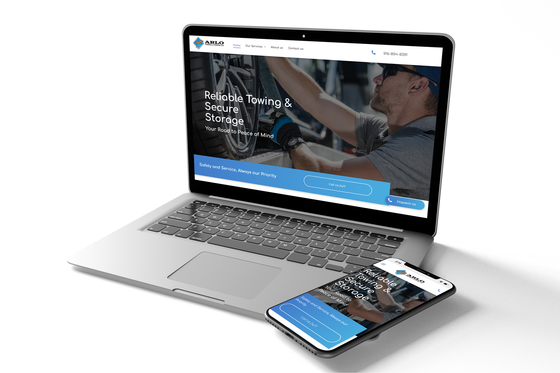 A laptop and a cell phone are open to the Arlo Towing and Storage website