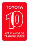 Red Toyota badge with the number 10 and text: