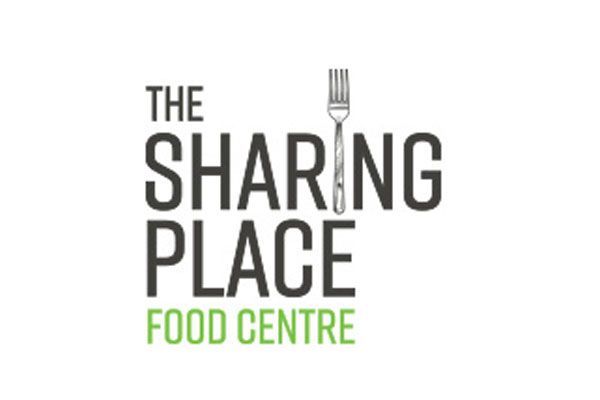 A logo for the sharing place food centre