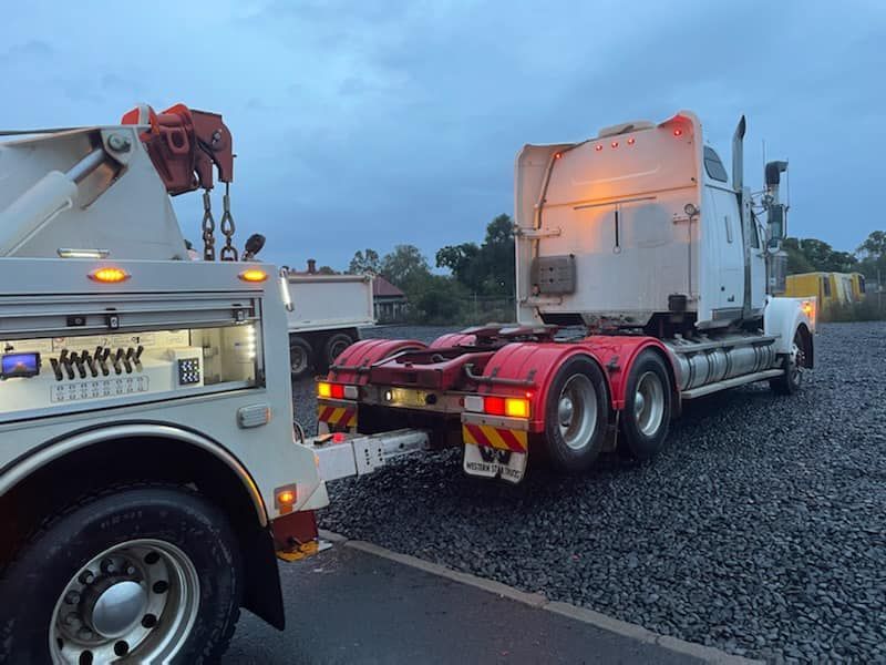 Two Truck Towing Truck In Open Area — Towing Service In Dubbo, NSW