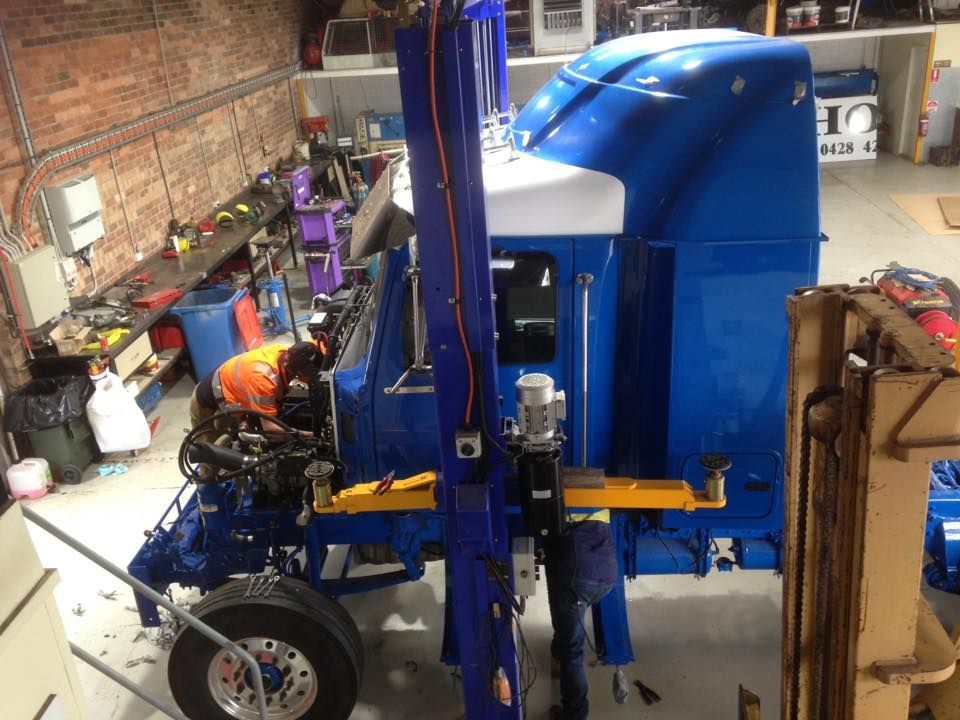 Man Repairing The Truck Wiring — Towing Service In Parkes, NSW