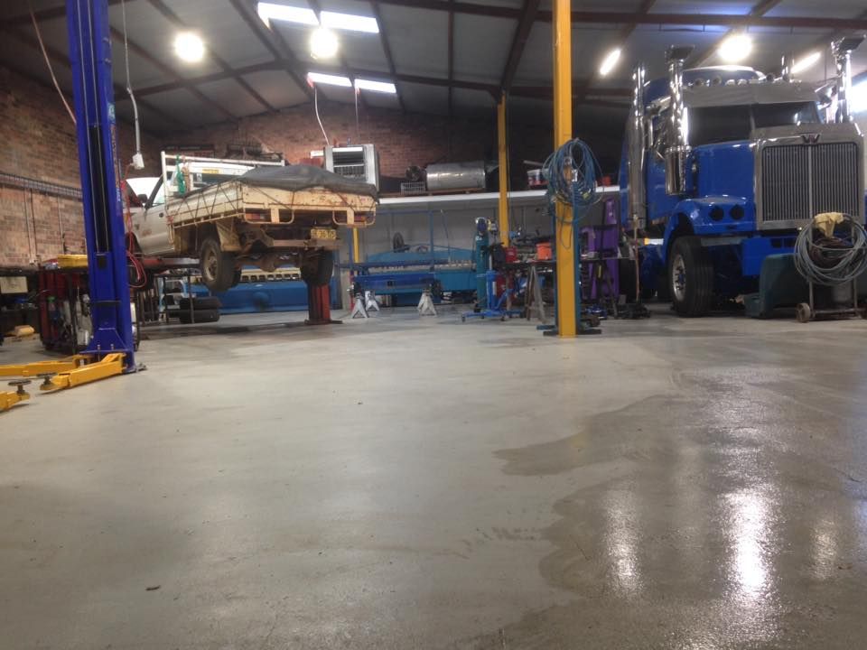 Small Truck And Big Truck In Workshop — Towing Service In Cobar, NSW