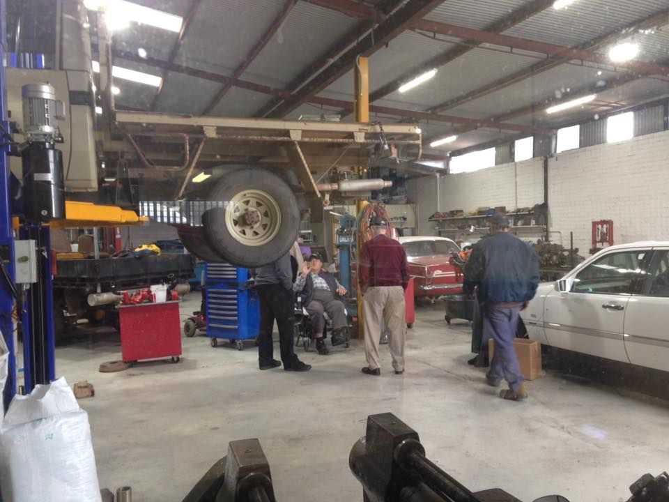 Group Of People Inside The Workshop — Towing Service In Coonabarabran, NSW